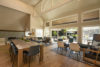 Open seating area with long wood table seating for 10 people.